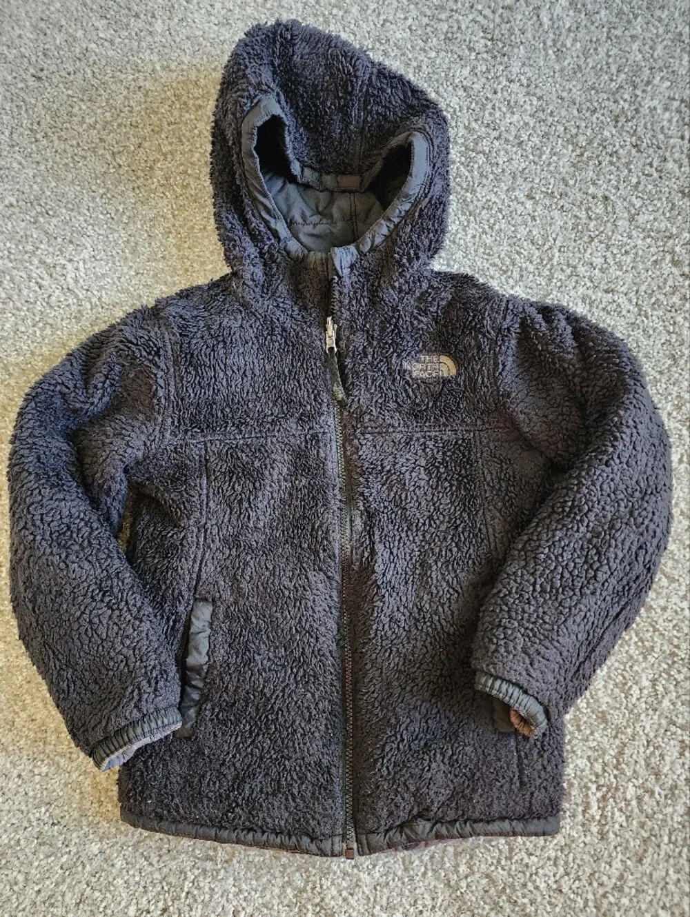 The North Face Camouflage Puffer Jacket in Black and Olive YOUTH